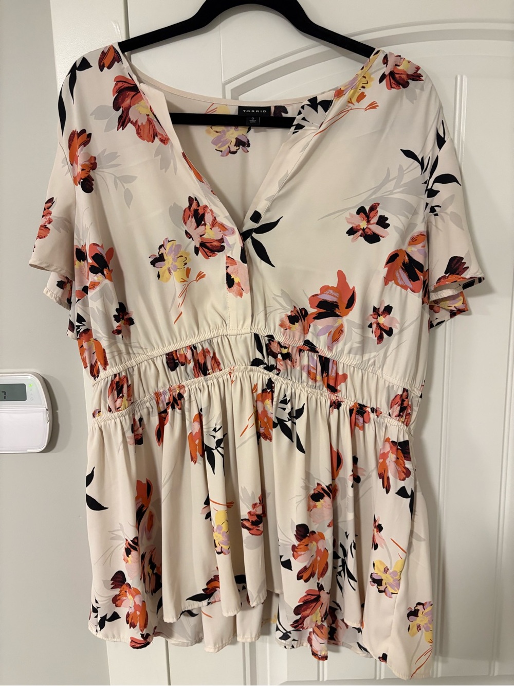 Light Cream Floral V-Neck Peplum Blouse